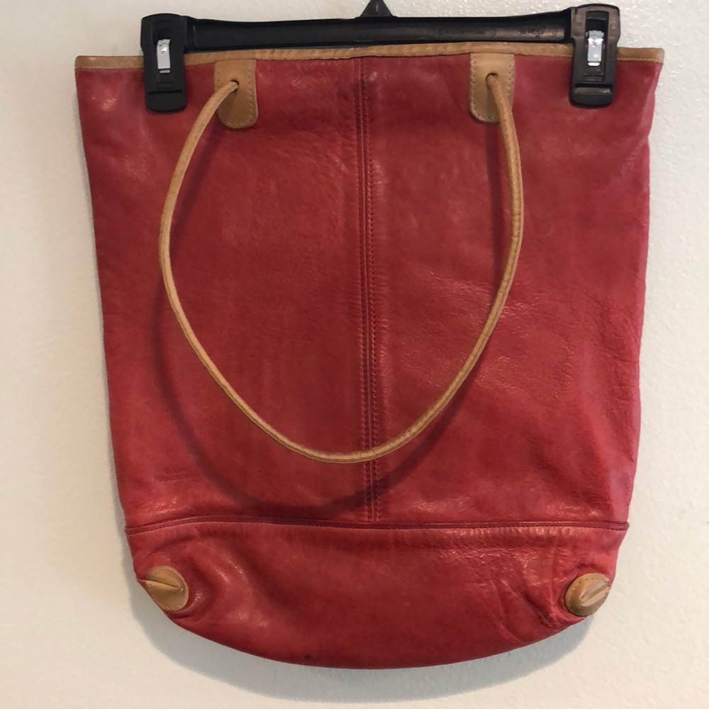 Red and beige, leather purse black lining magnetic button to close